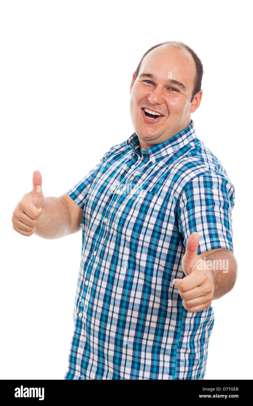 Happy ecstatic man gesturing thumbs up, isolated on white background Stock Photo