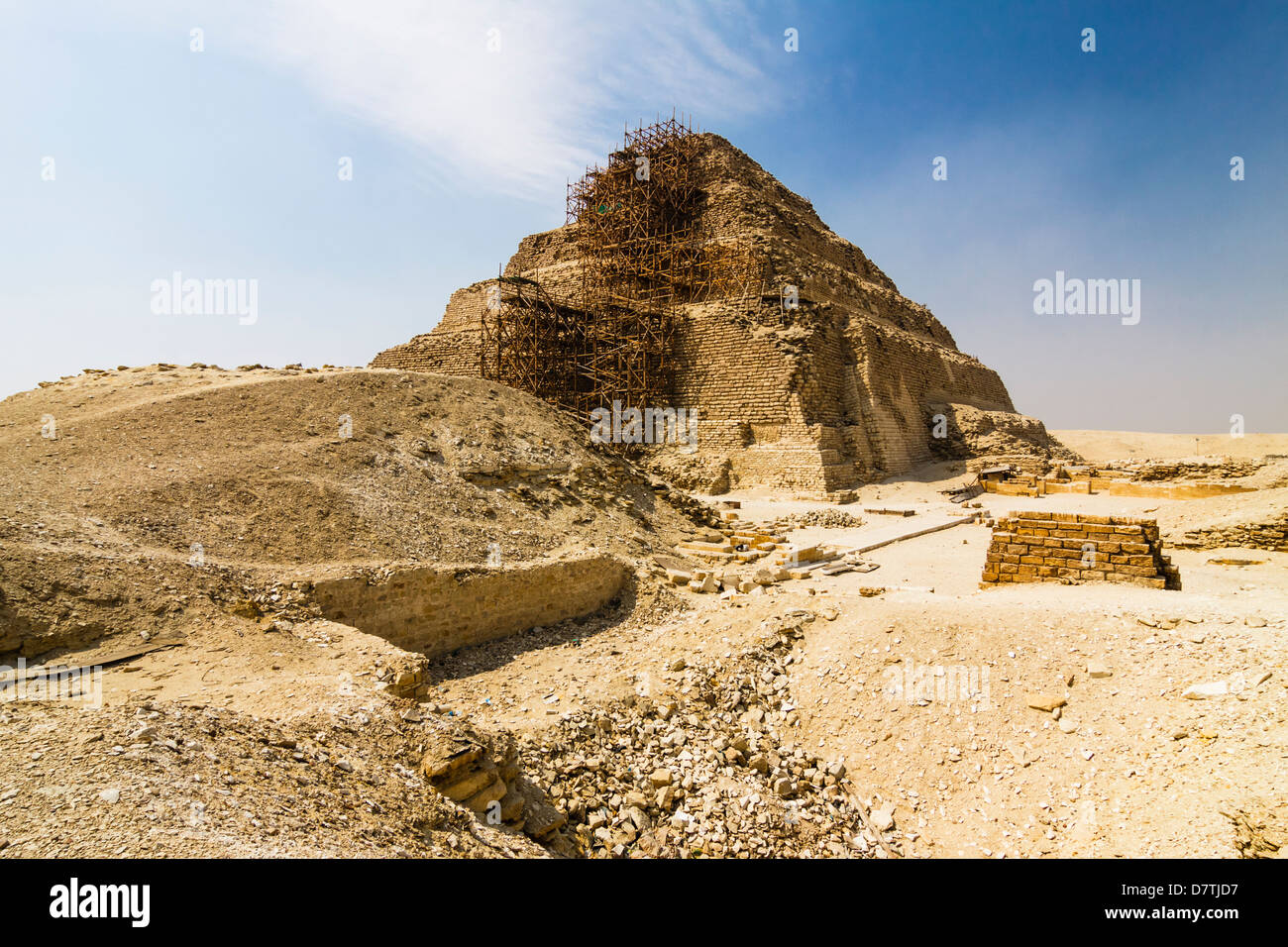 Step Pyramid of Zoser at Saqqara covered in scaffolding. Egypt Stock Photo