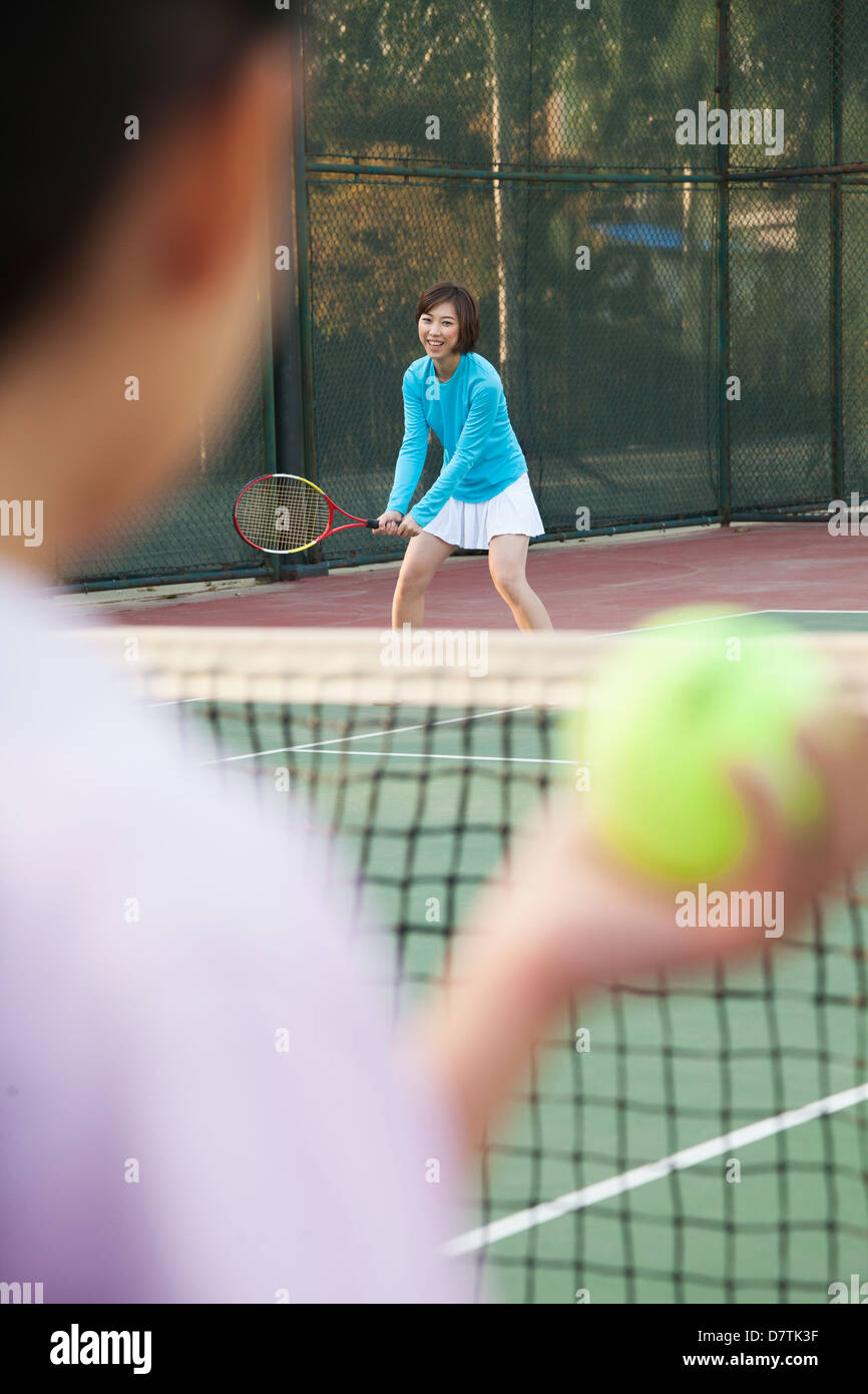Mother and daughter playing tennis Stock Photo Alamy