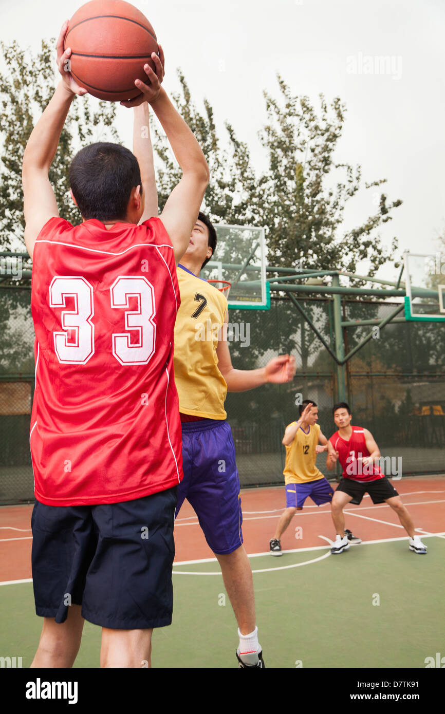 Two teams playing basketball Stock Photo Alamy