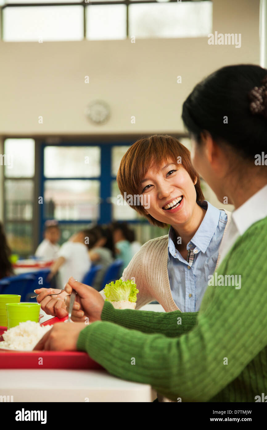 Teachers talking at lunch in school cafeteria Stock Photo 56476753 Alamy
