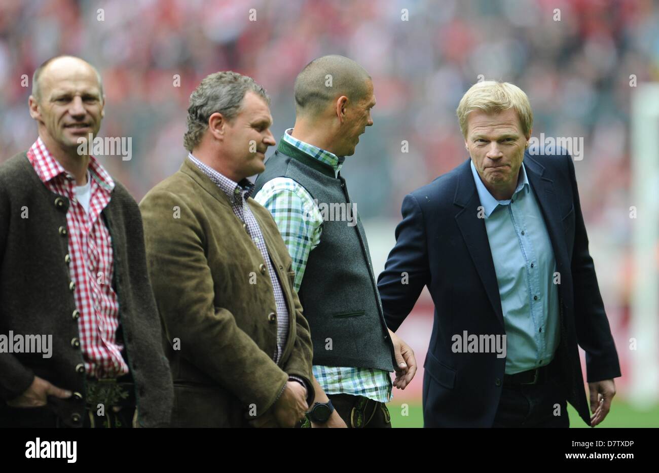 Former players of Bayern Munich Hans Pfluegler (L-R), Franz Wohlfahrt, Christian Ziege and Oliver Kahn pose for a picture before the Bundesliga soccer match between Bayern Munich and FC Augsburg at Allianz Arena in Munich, Germany, 11 May 2013. Photo: Andreas Gebert Stock Photo