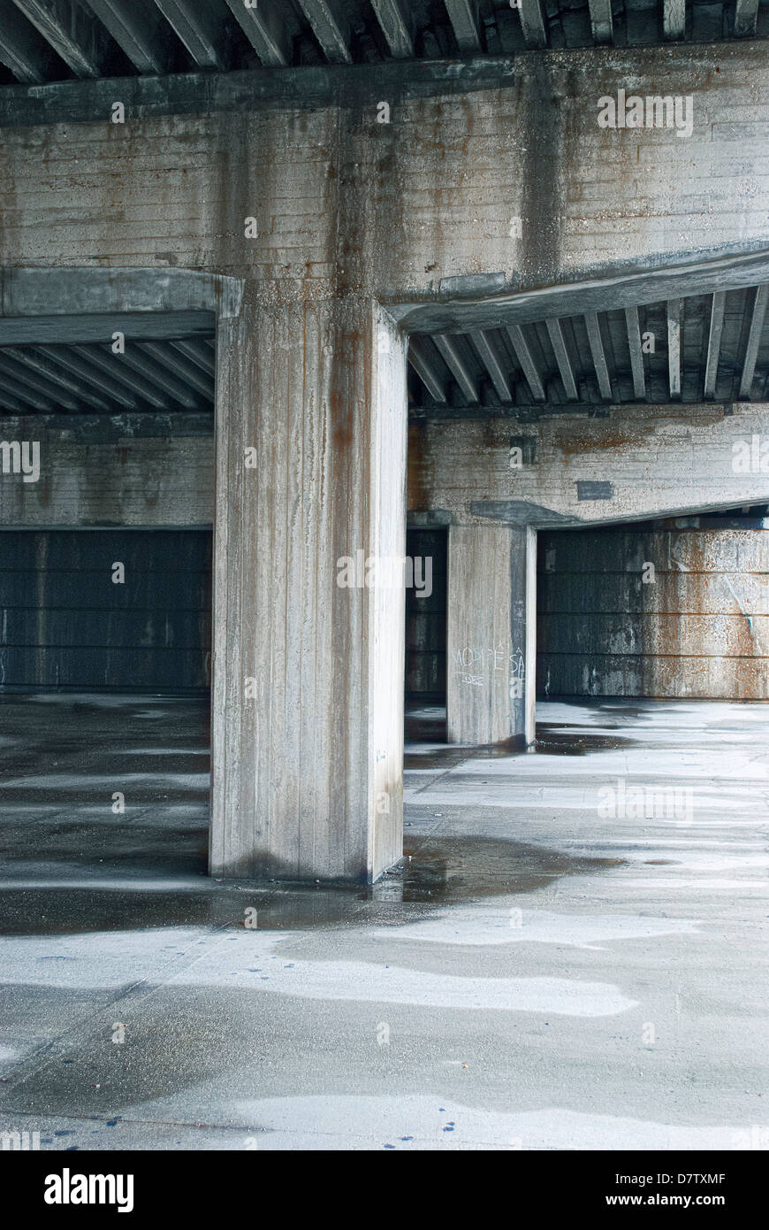 A disturbing, wet and dirty empty parking Stock Photo