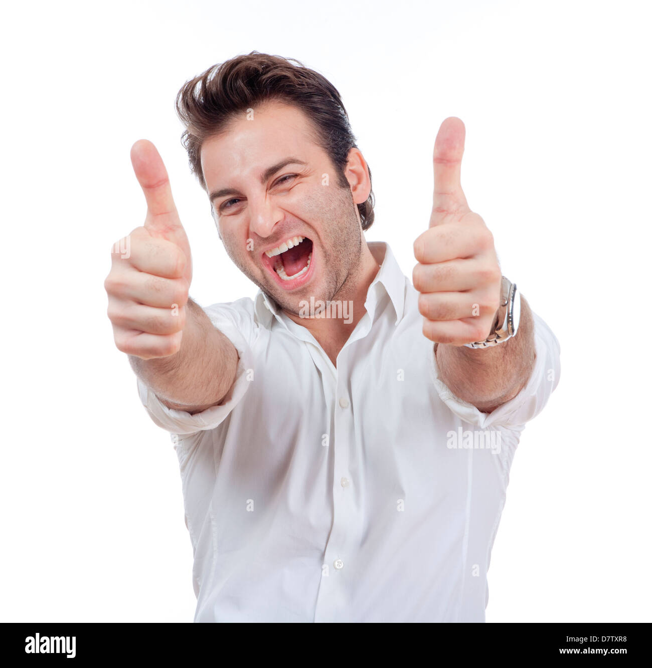 excited man laughing holding his both thumbs up - isolated on white Stock Photo