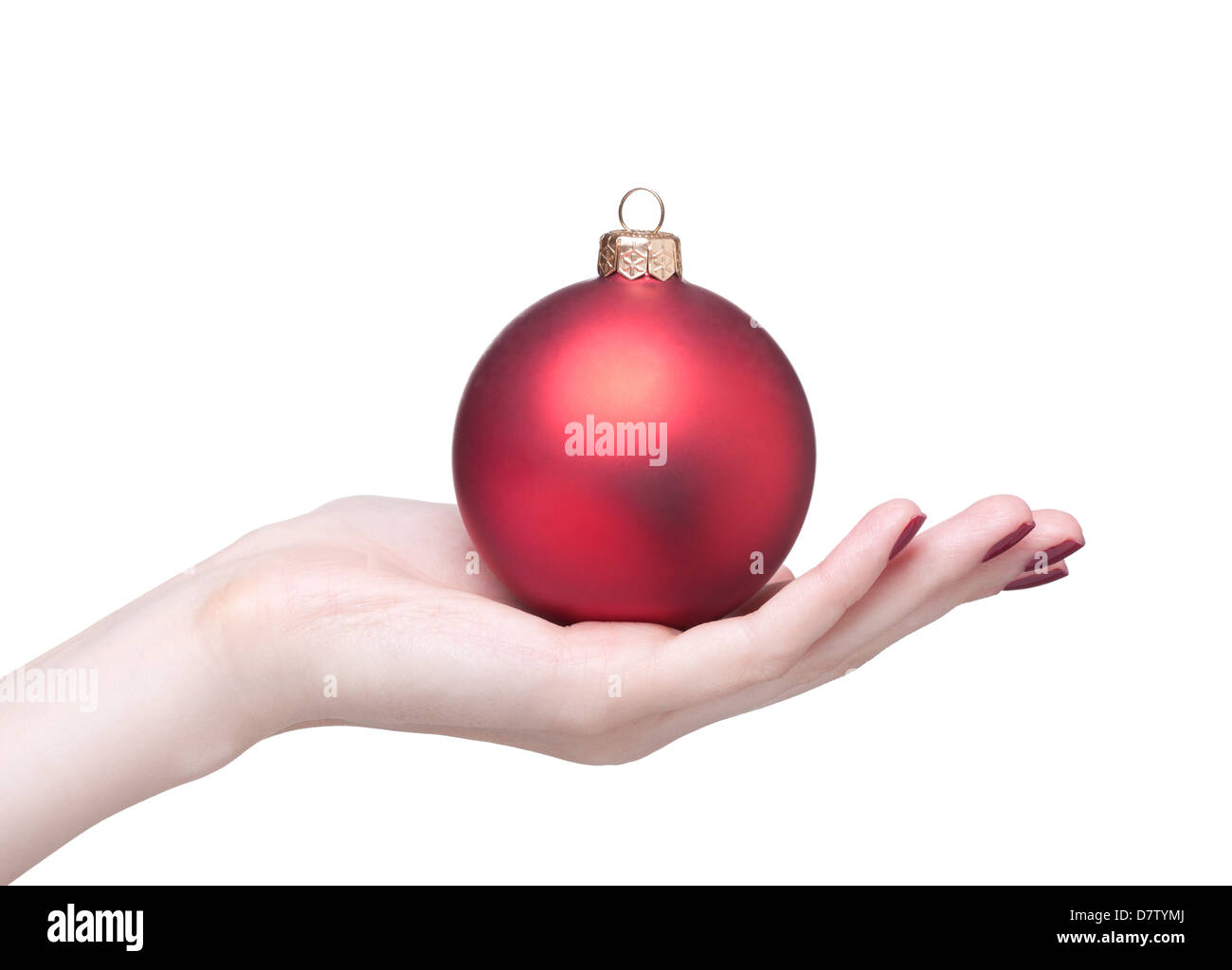 hands with red dull luster Christmas ball isolated on white Stock Photo