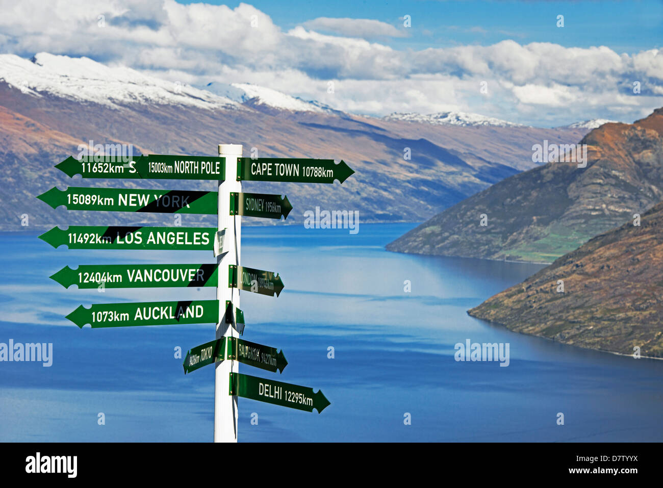 All directions sign post, Queenstown, Otago, South Island, New Zealand Stock Photo