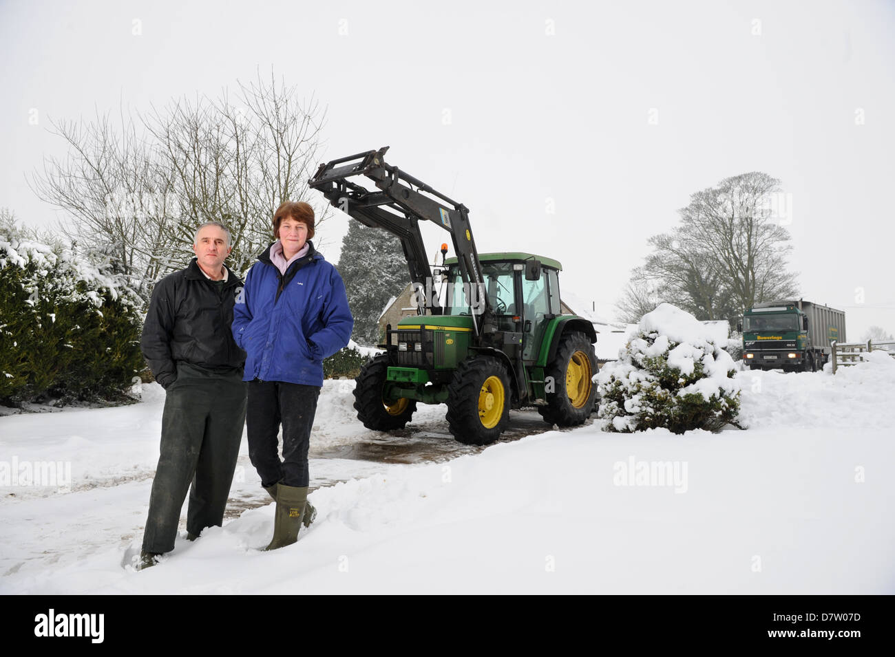 Dairy Farmers Chris & Liz Best from Poole Farm Leighterton near Tetbury, Gloucestershire who have had to discard milk when the t Stock Photo