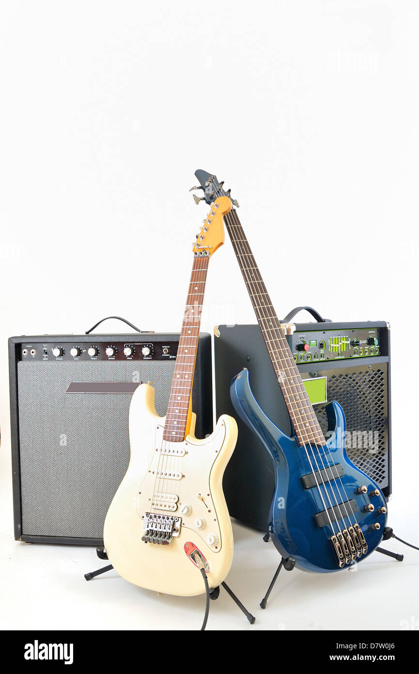 guitars and amplifiers on white background Stock Photo