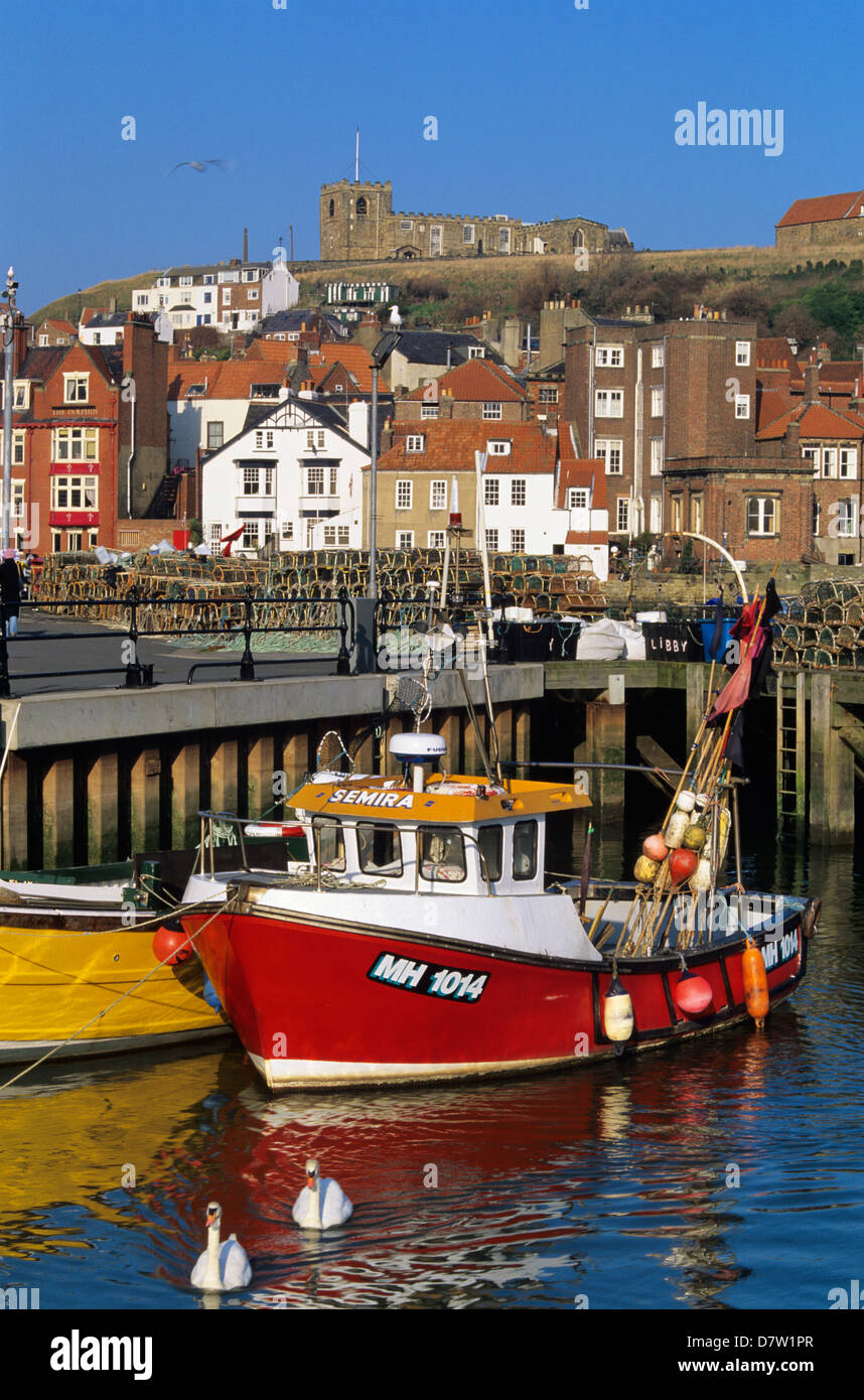 View over fishing harbour to St. Mary's Church, Whitby, Yorkshire, England, United Kingdom Stock Photo