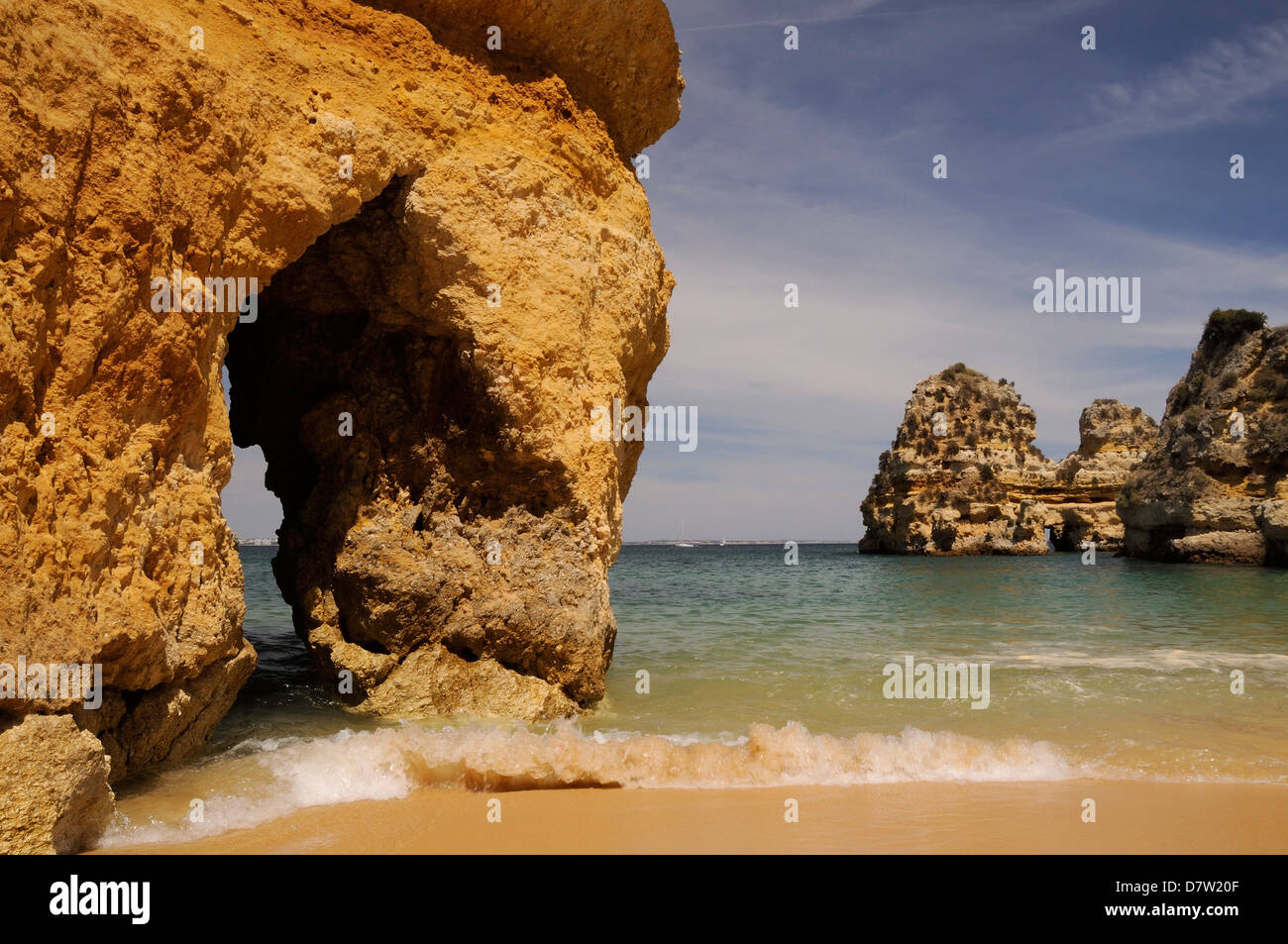 Rock archways at Praia do Camilo (Camel beach), Lagos, Algarve, Portugal Stock Photo