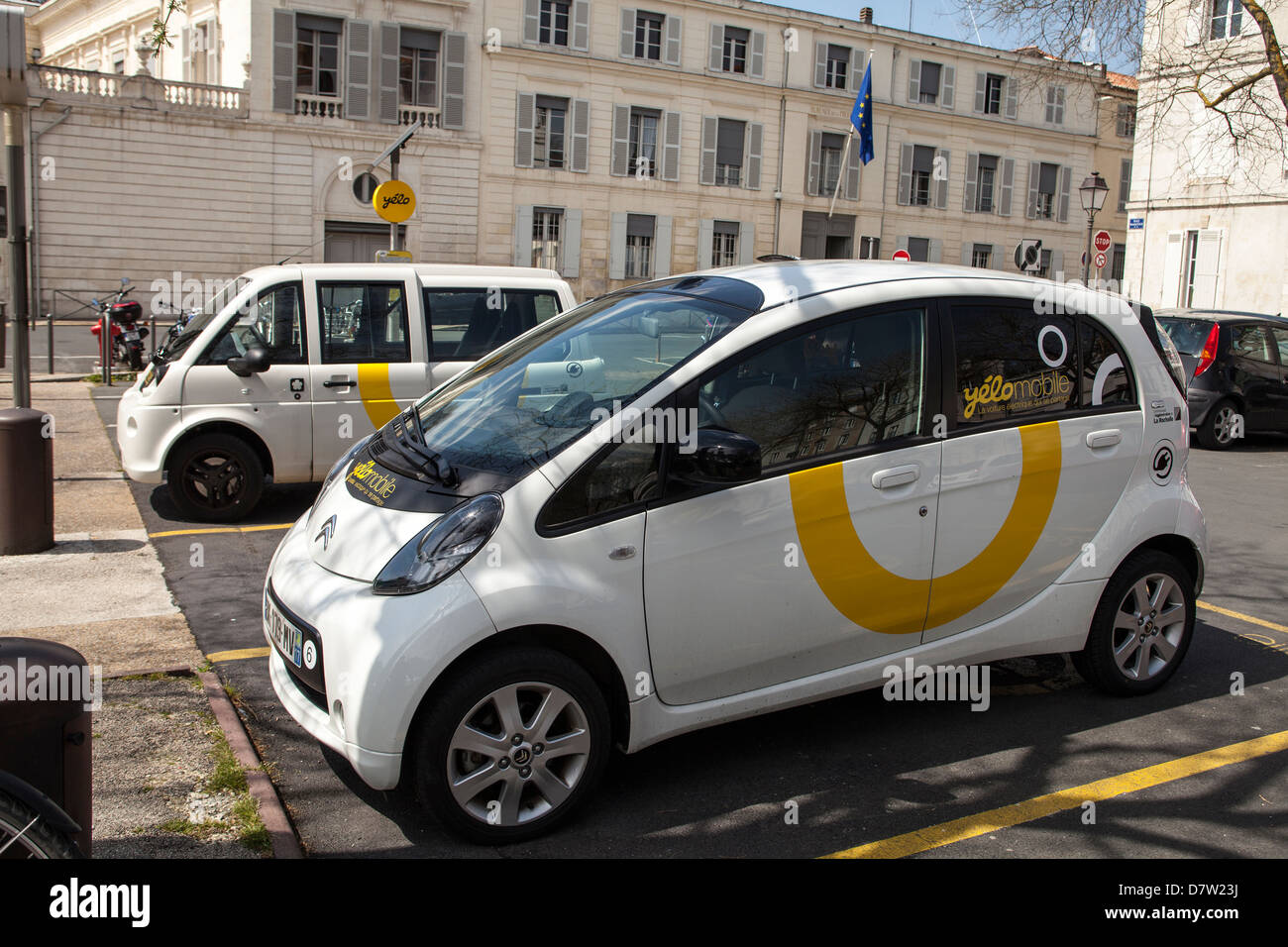 A Yelomobile electric car sharing station in the old city of La Rochelle, France Stock Photo