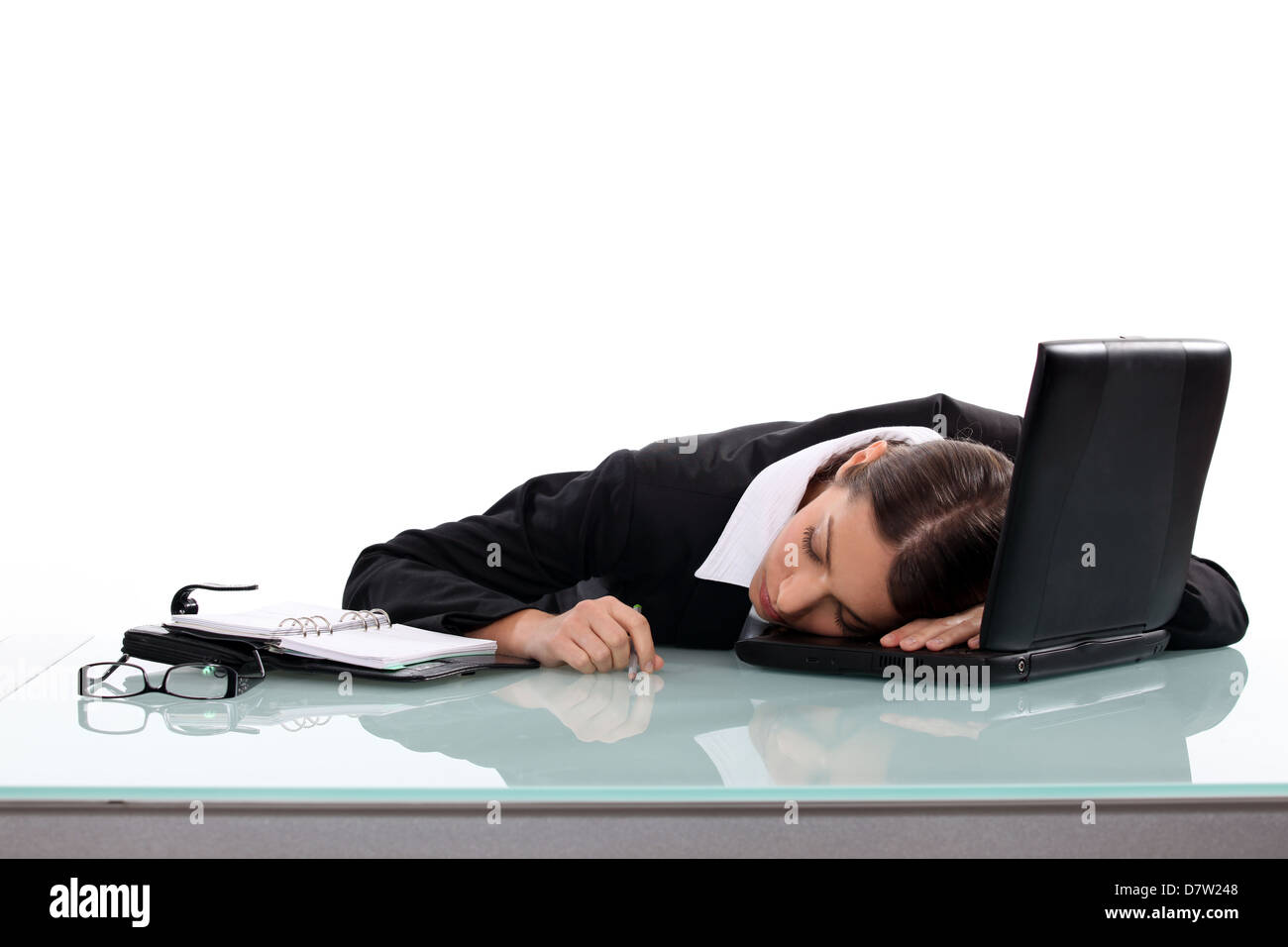 Woman asleep at her desk Stock Photo - Alamy