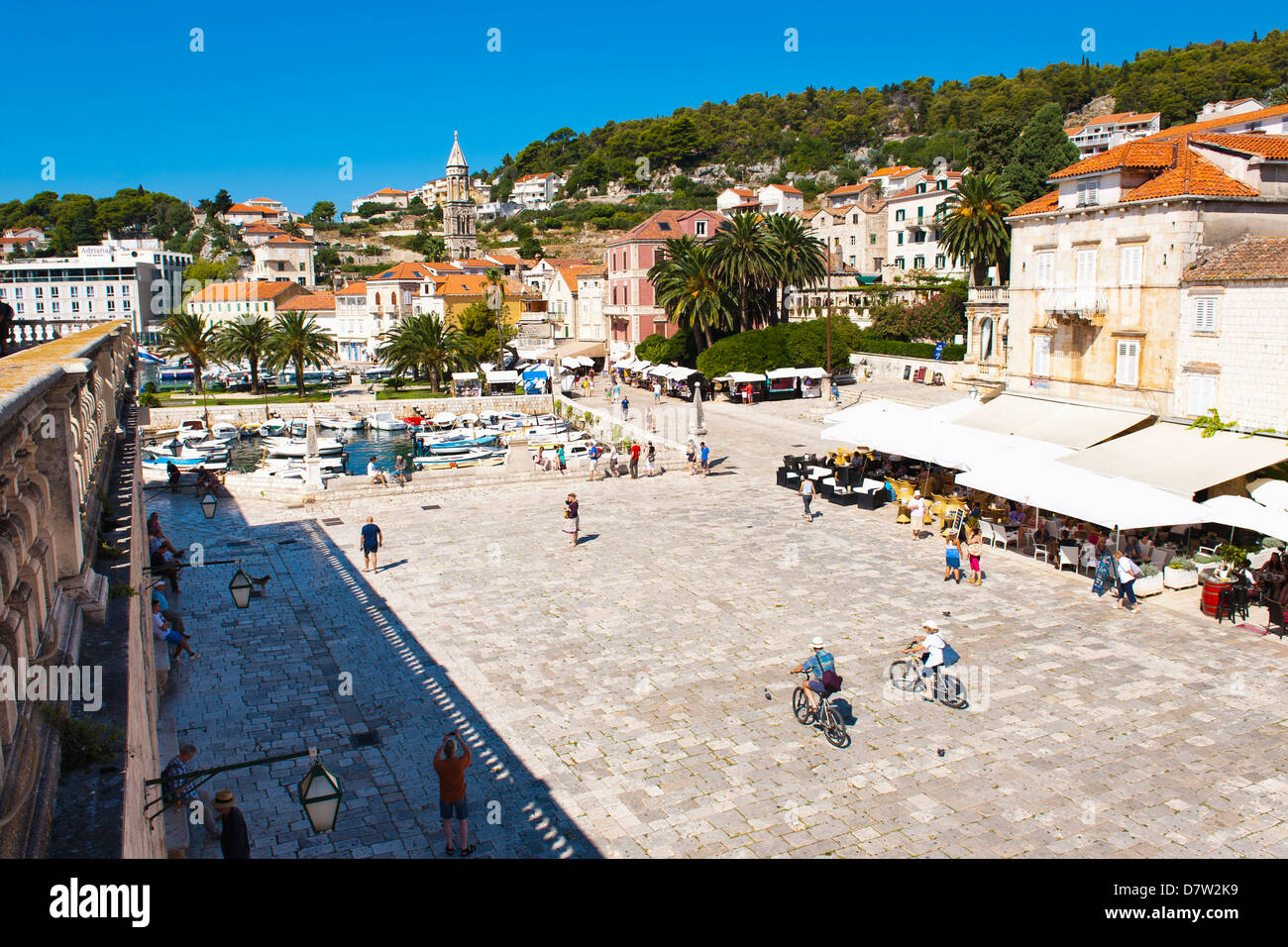 Cafes and tourists in St. Stephens Square, Hvar Town, Hvar Island, Dalmatian Coast, Croatia Stock Photo