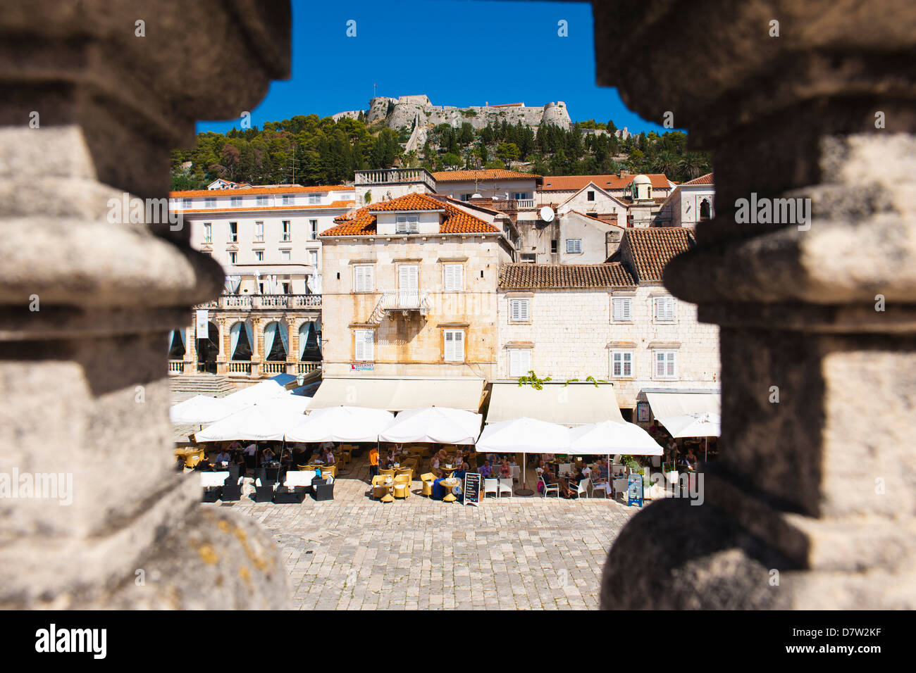 Spanish Fortress above St. Stephens Square cafes, Hvar Town, Hvar Island, Dalmatian Coast, Croatia Stock Photo