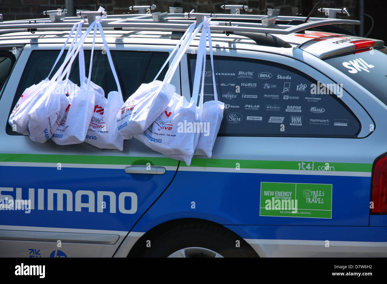Skill Shimano team car with ravitaillement bags hanging on the door, ready for assistance to the riders. Fleche Wallone race. Stock Photo