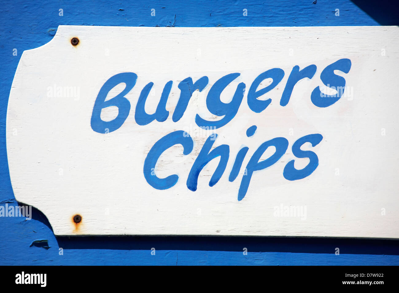 burgers chips painted sign in UK Stock Photo