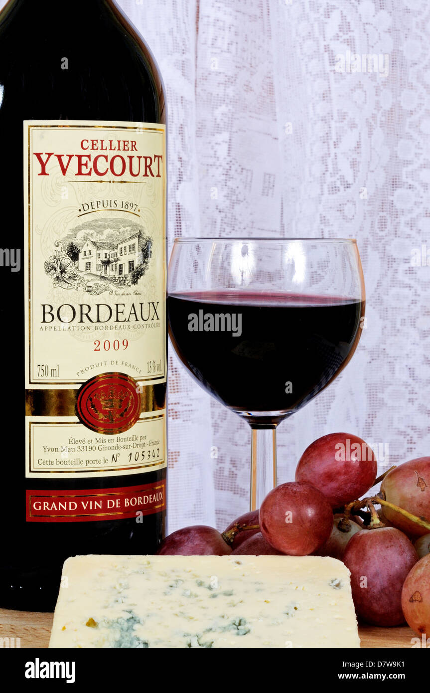 Bleu d'Auvergne cheese, red wine and red grapes Stock Photo Alamy