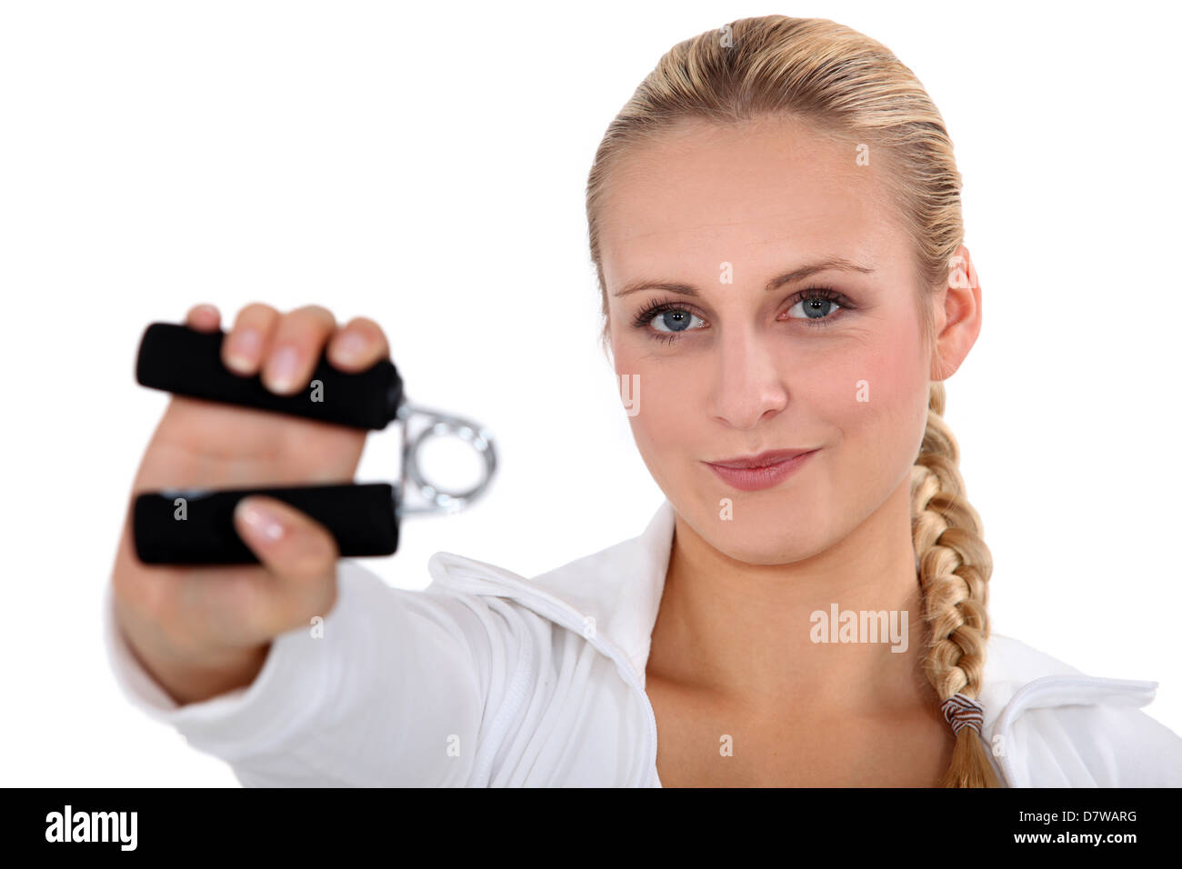 blonde woman using hand grip Stock Photo Alamy