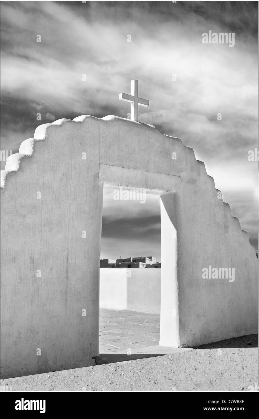 A black & white image of St Jerome's front entrance at Taos Pueblo Stock Photo