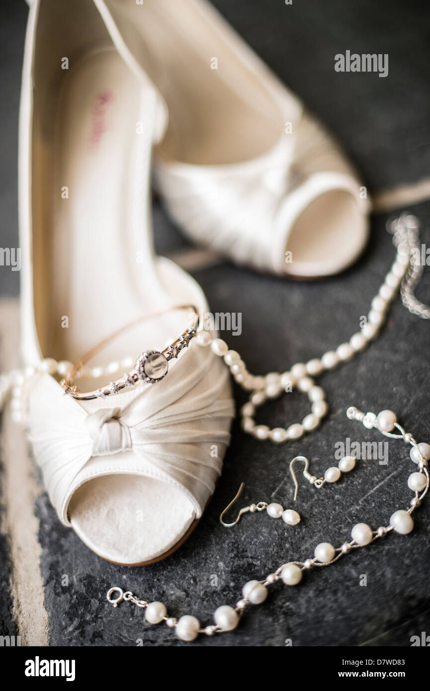 Shoes and jewelery - Getting married - wedding day details, UK Stock Photo