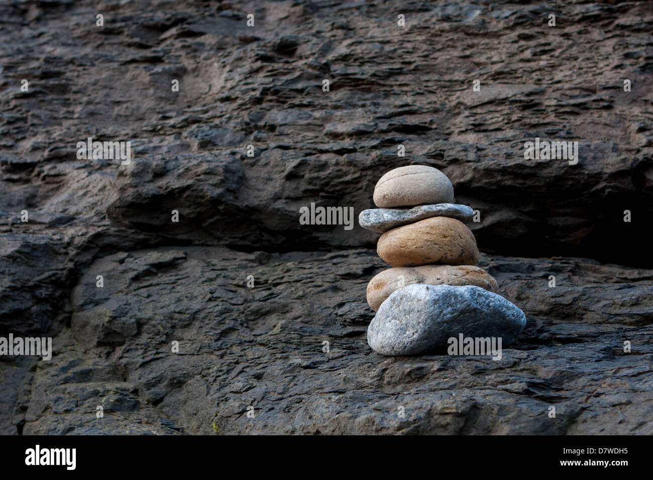 Stacked Pebbles forming a small cairn Stock Photo