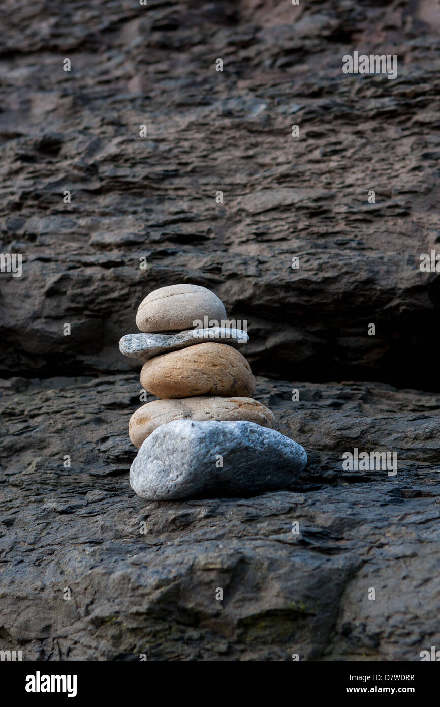 Stacked Pebbles forming a small cairn Stock Photo
