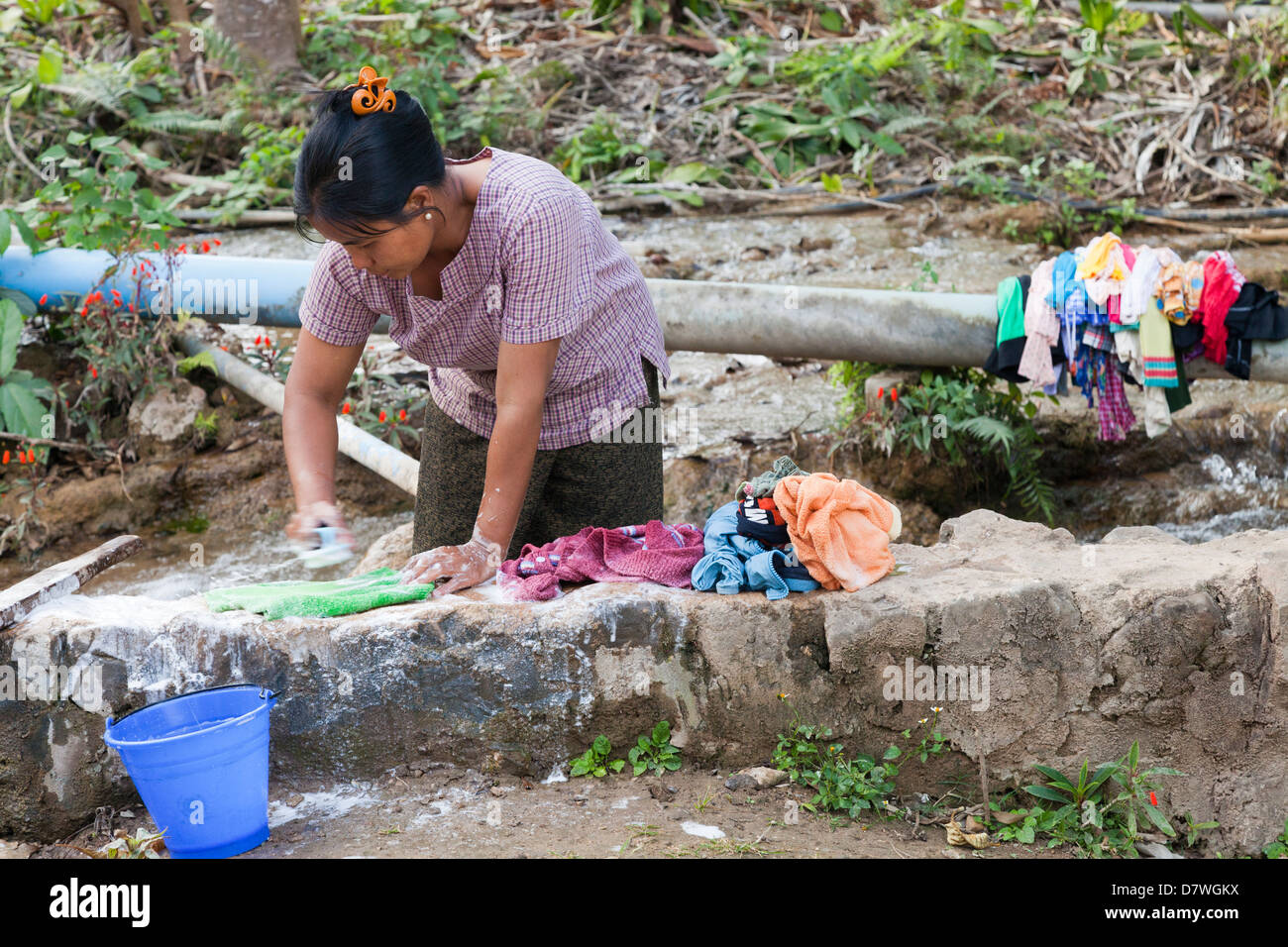 Old-fashioned washday at Peik Khyin Myaung, Myanmar Stock Photo