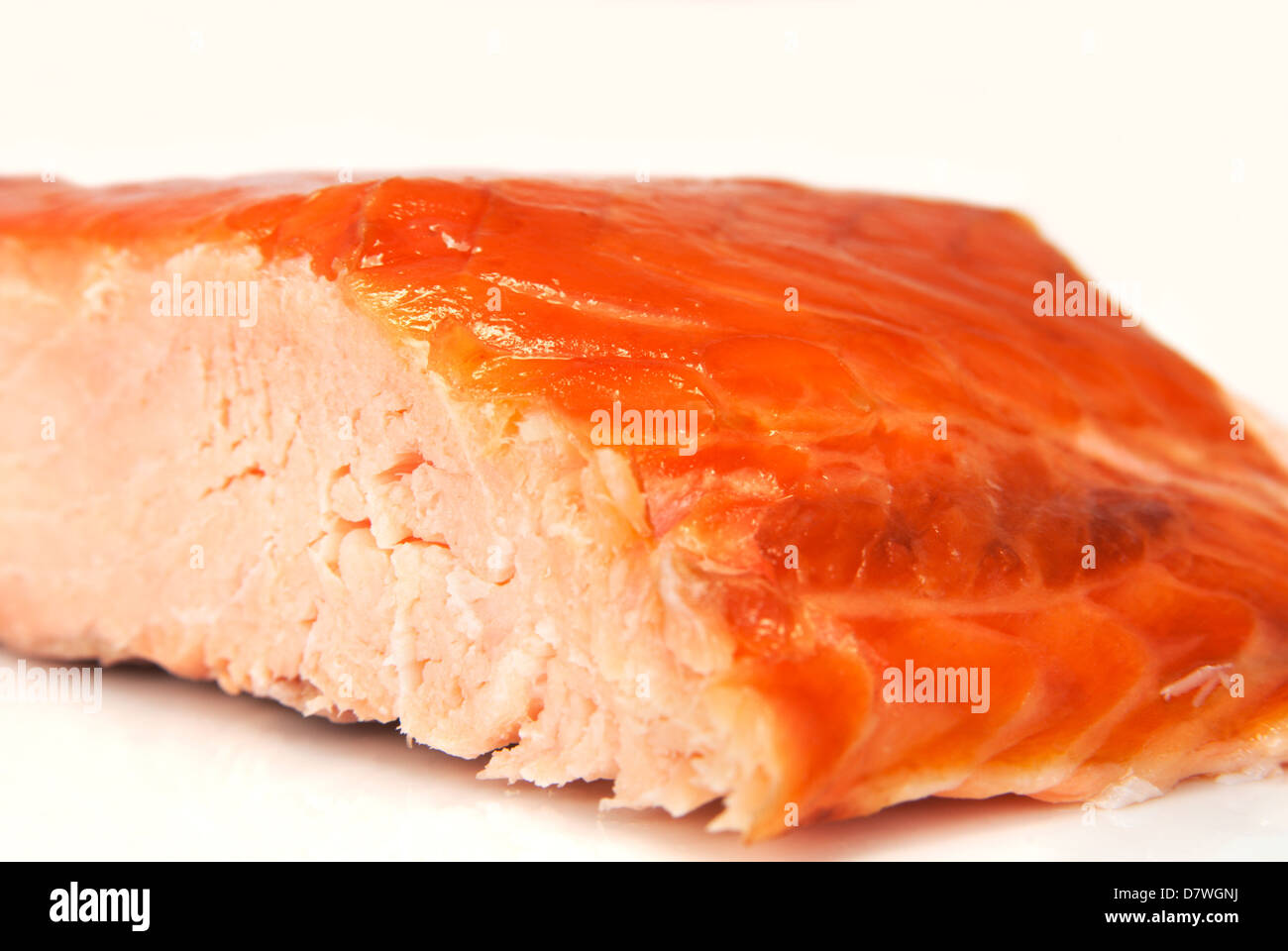 Tight crop of hot smoked Scottish salmon. Shallow dof. Stock Photo
