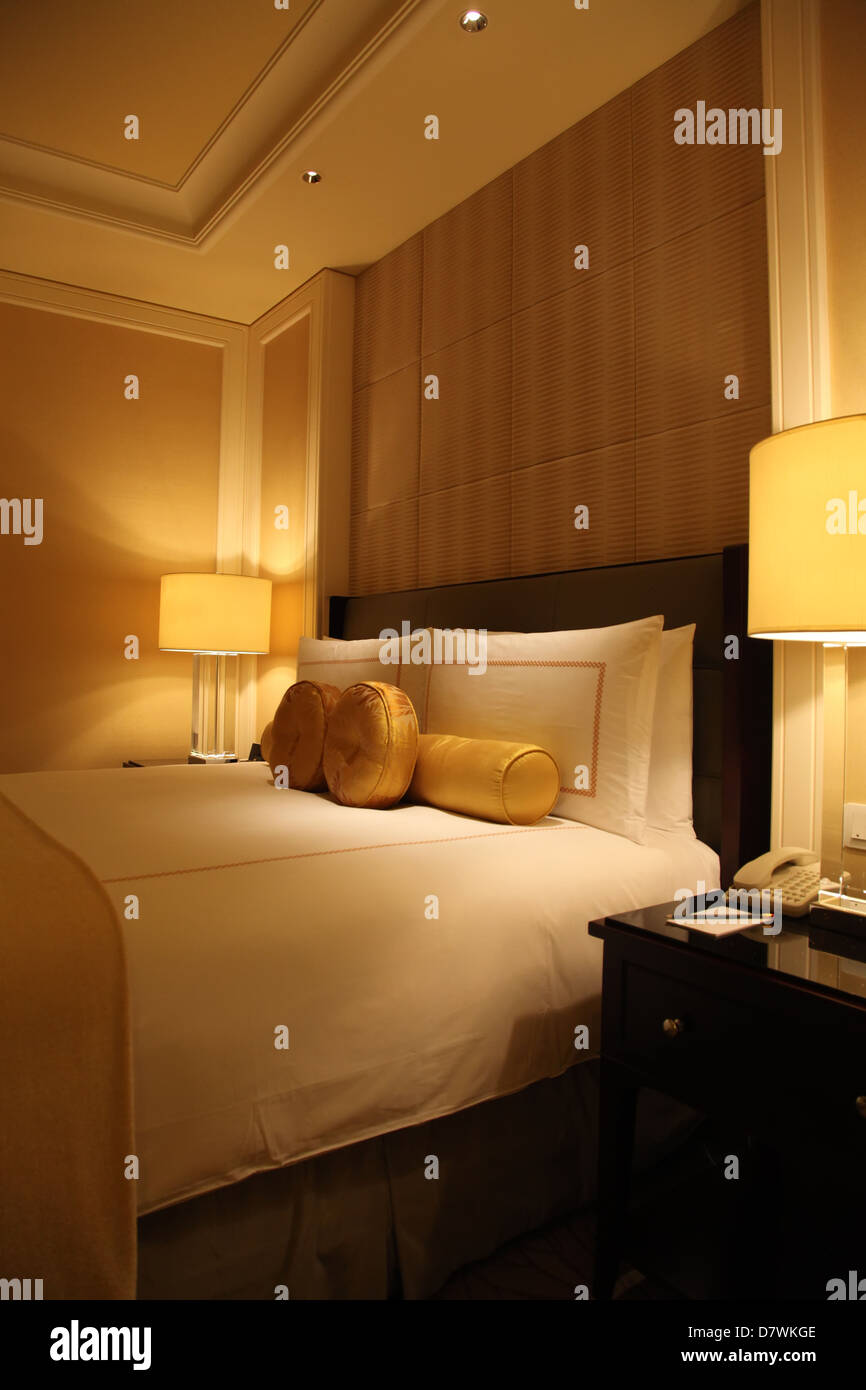 Luxury Hotel Room At Night In Bedroom Stock Photo 56497854