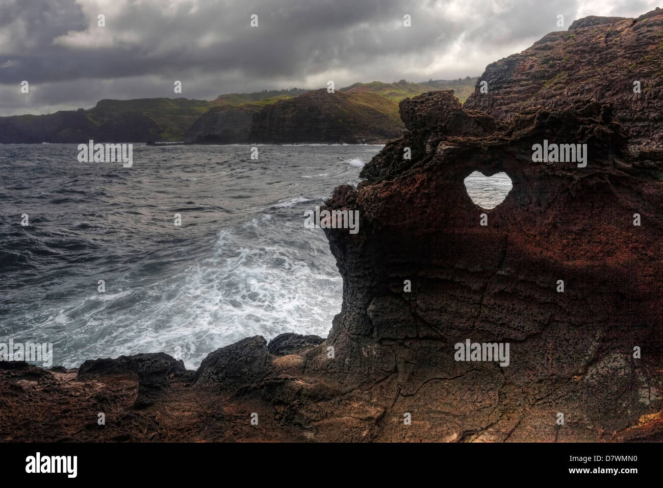 A Heart Shaped Hole In The Rock At Nakele Hawaii Stock Photo Alamy