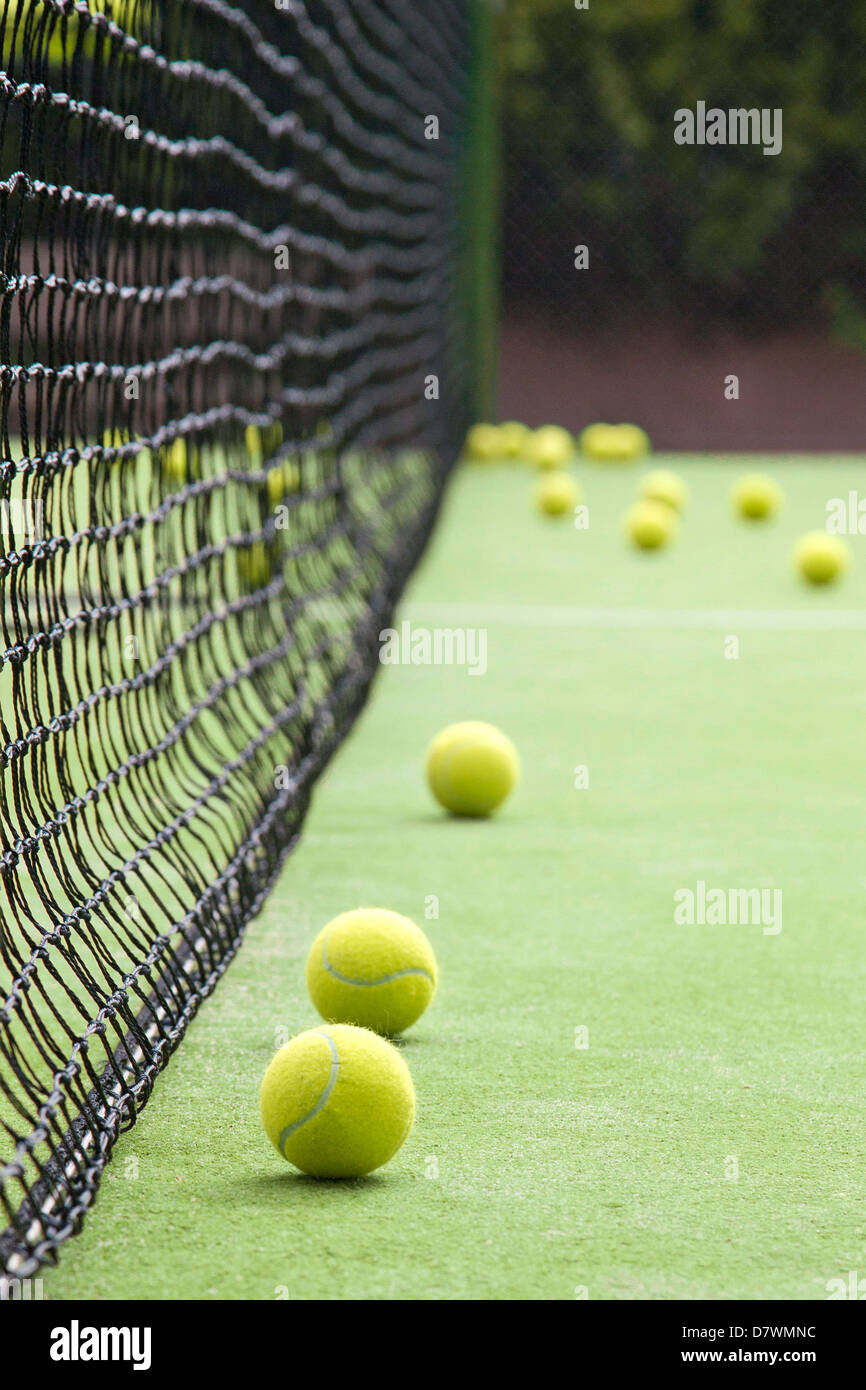 Tennis balls in tennis court. Stock Photo