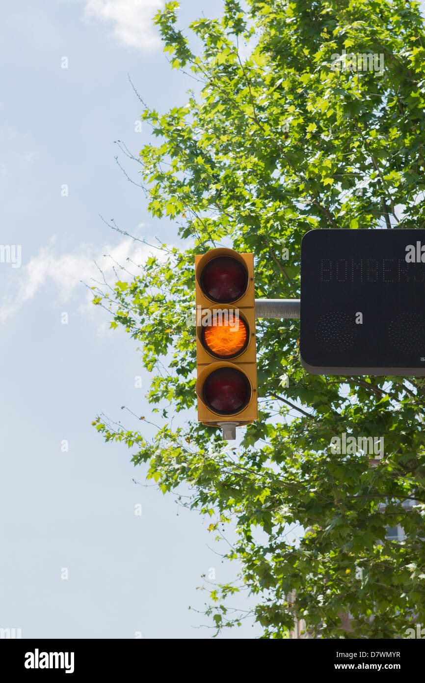 Traffic lights with amber light on. Amber prepare to go, proceed with
