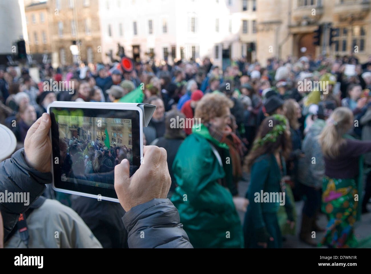 May day morning tourist taking photograph using their ipad tablets mobile devise Oxford Oxfordshire 2013 2010s UK  HOMER SYKES Stock Photo