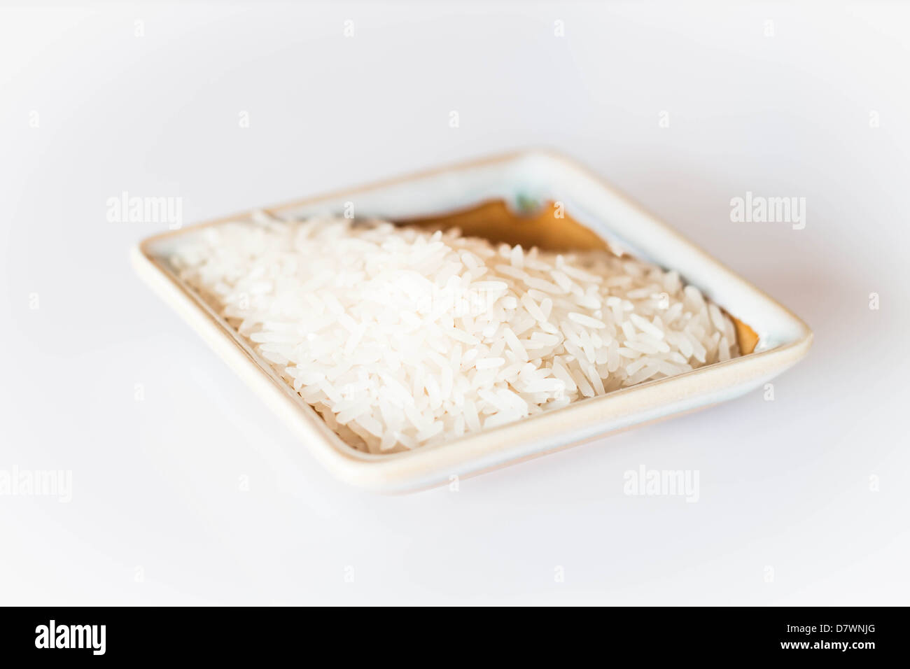 White rice cereal food on clean table Stock Photo Alamy