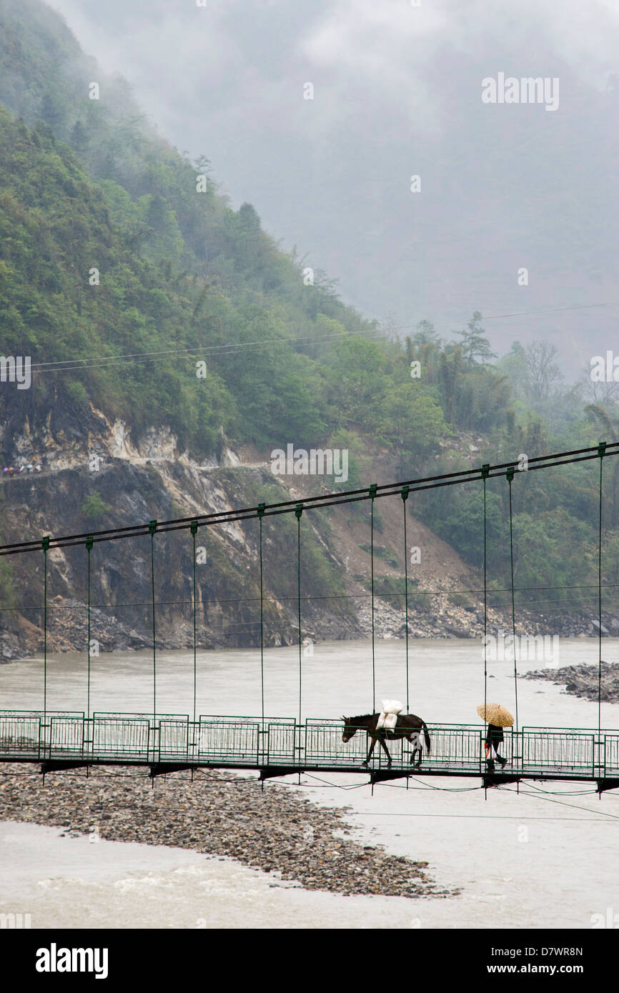 Footbridge on the Nujiang River, Yunnan, China. Near Fugong. Stock Photo