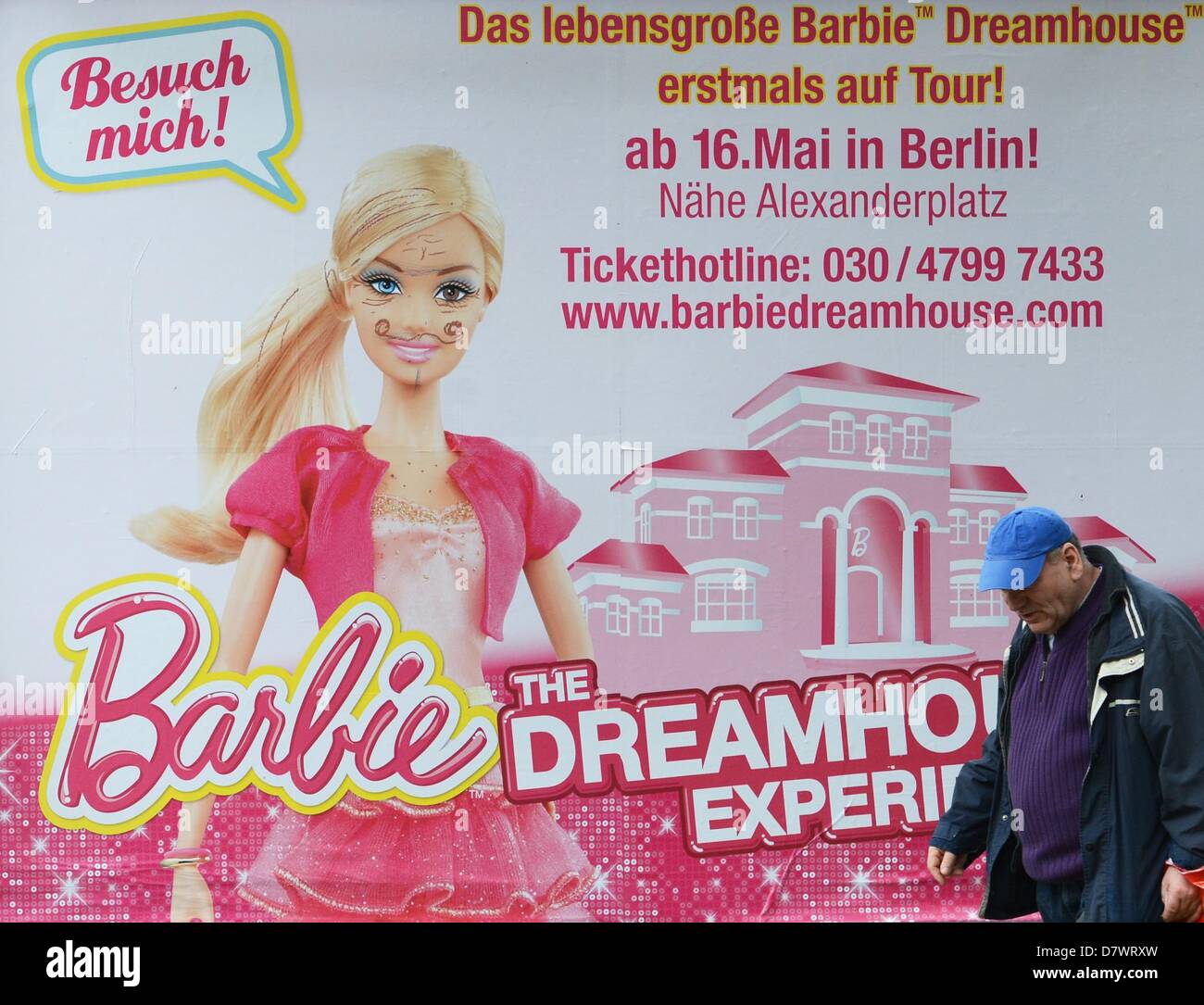 A advertising poster has been defaced for 'Barbie The Dreamhouse Stock  Photo - Alamy