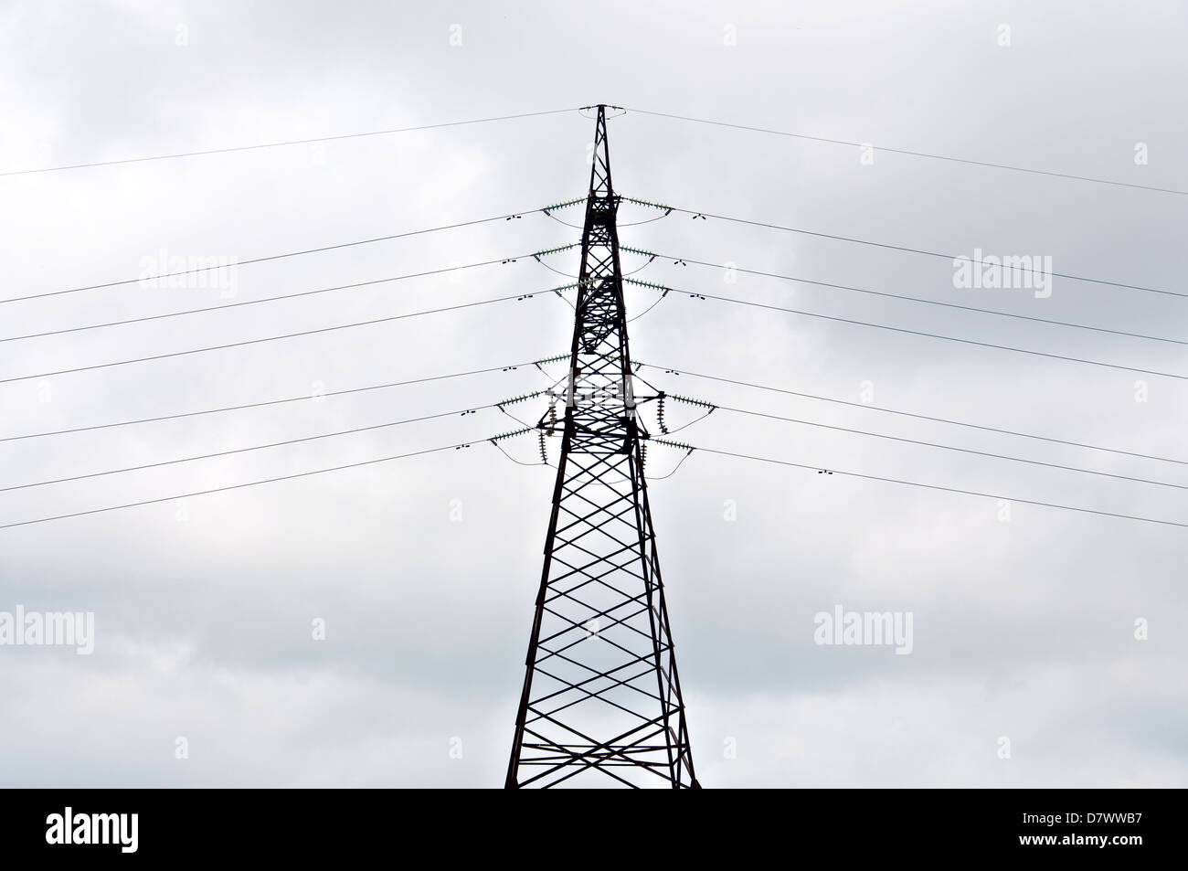 Power line against the background of the cloudy sky Stock Photo - Alamy