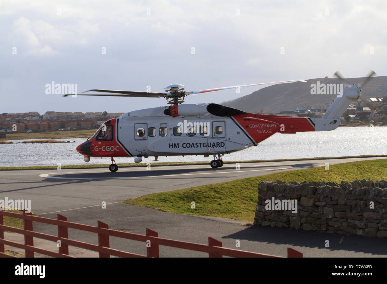 A coastguard helicopter coming in to land at Clickimin Leisure Centre, Lerwick, Shetland Islands Stock Photo
