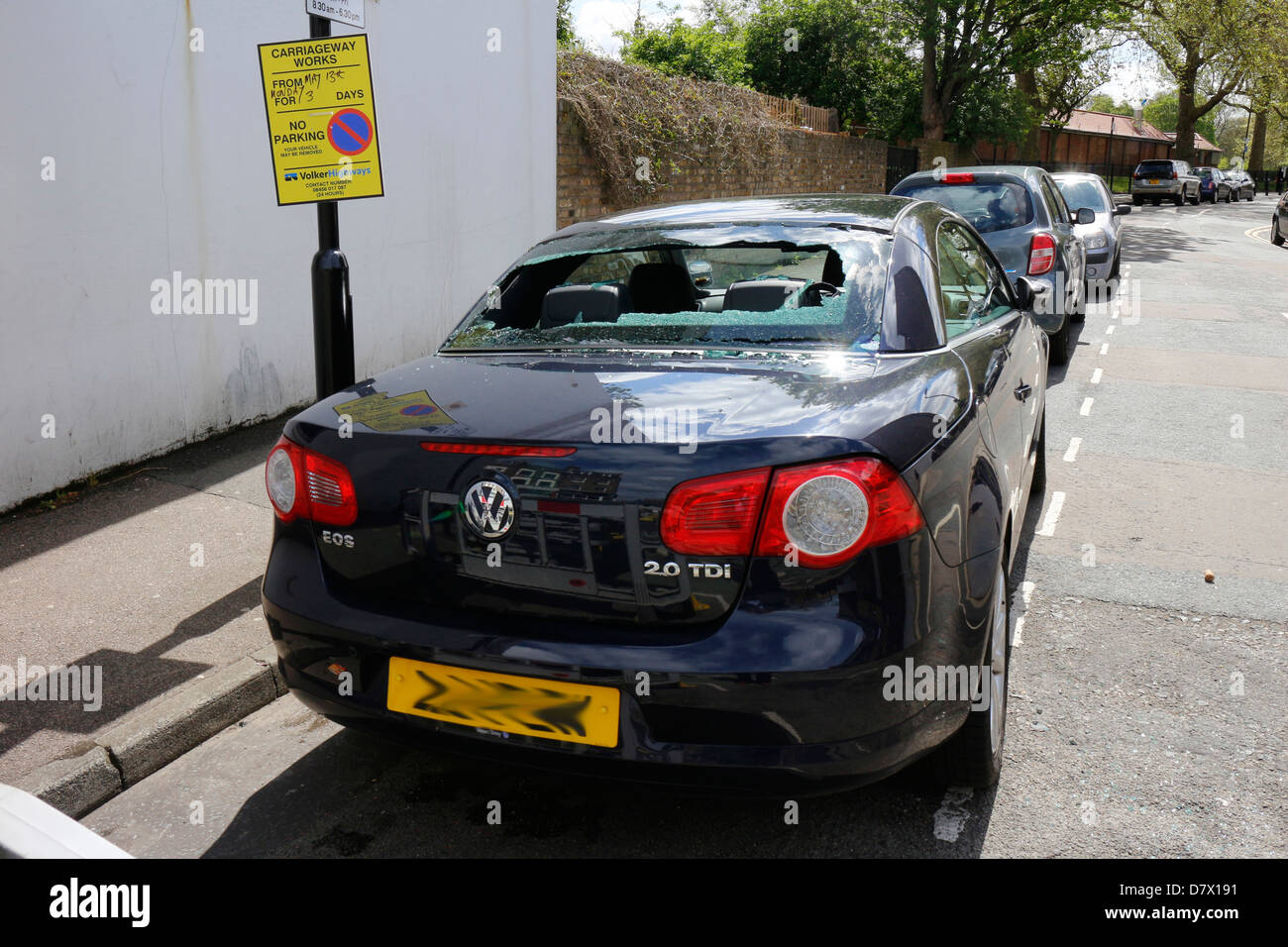 Rear windscreen of car smashed up, window broken into by thieves
