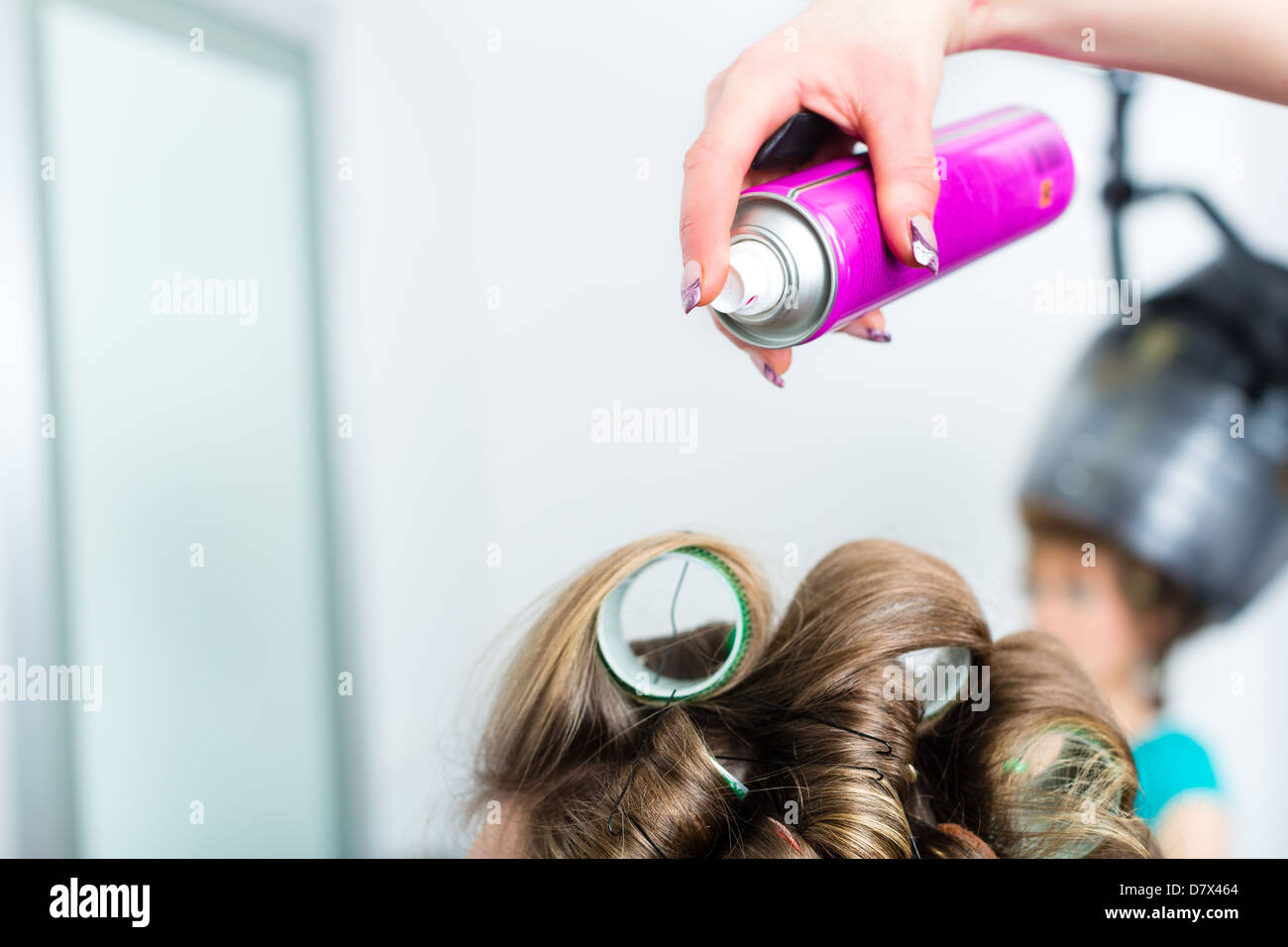Woman hairspray curls hi-res stock photography and images - Alamy