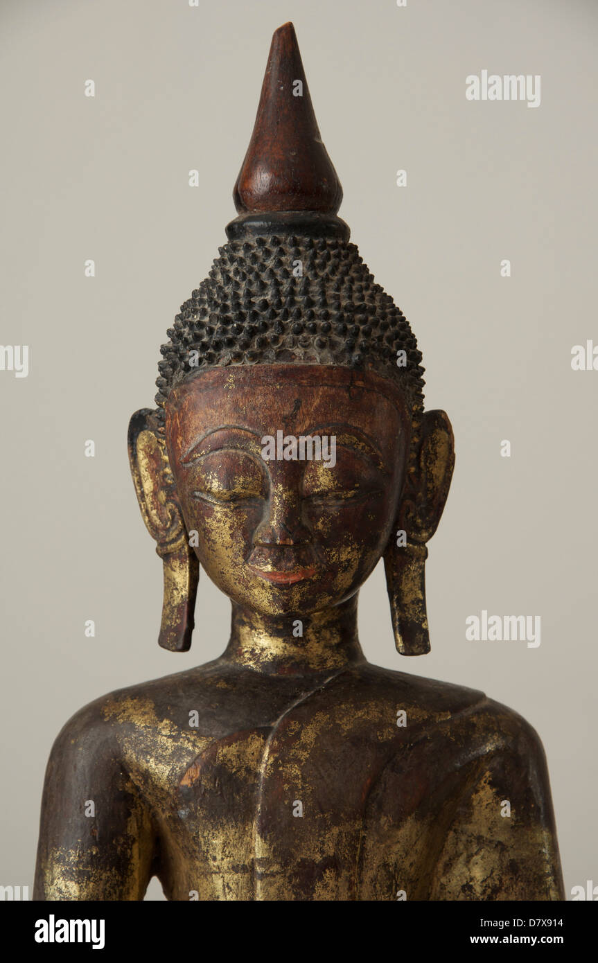 A decorative, ornamental glass head representation of Buddha, the  spiritualist leader of the Buddhist philosophy Stock Photo - Alamy