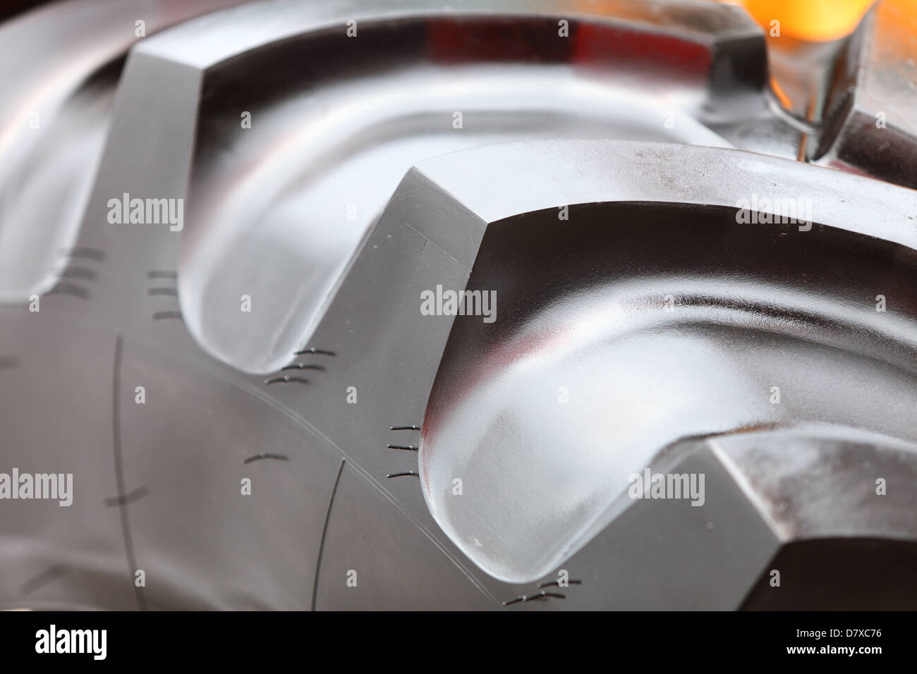 Detailed view of heavy vehicle rubber tire tread texture of a new tractor or other construction machinery Stock Photo