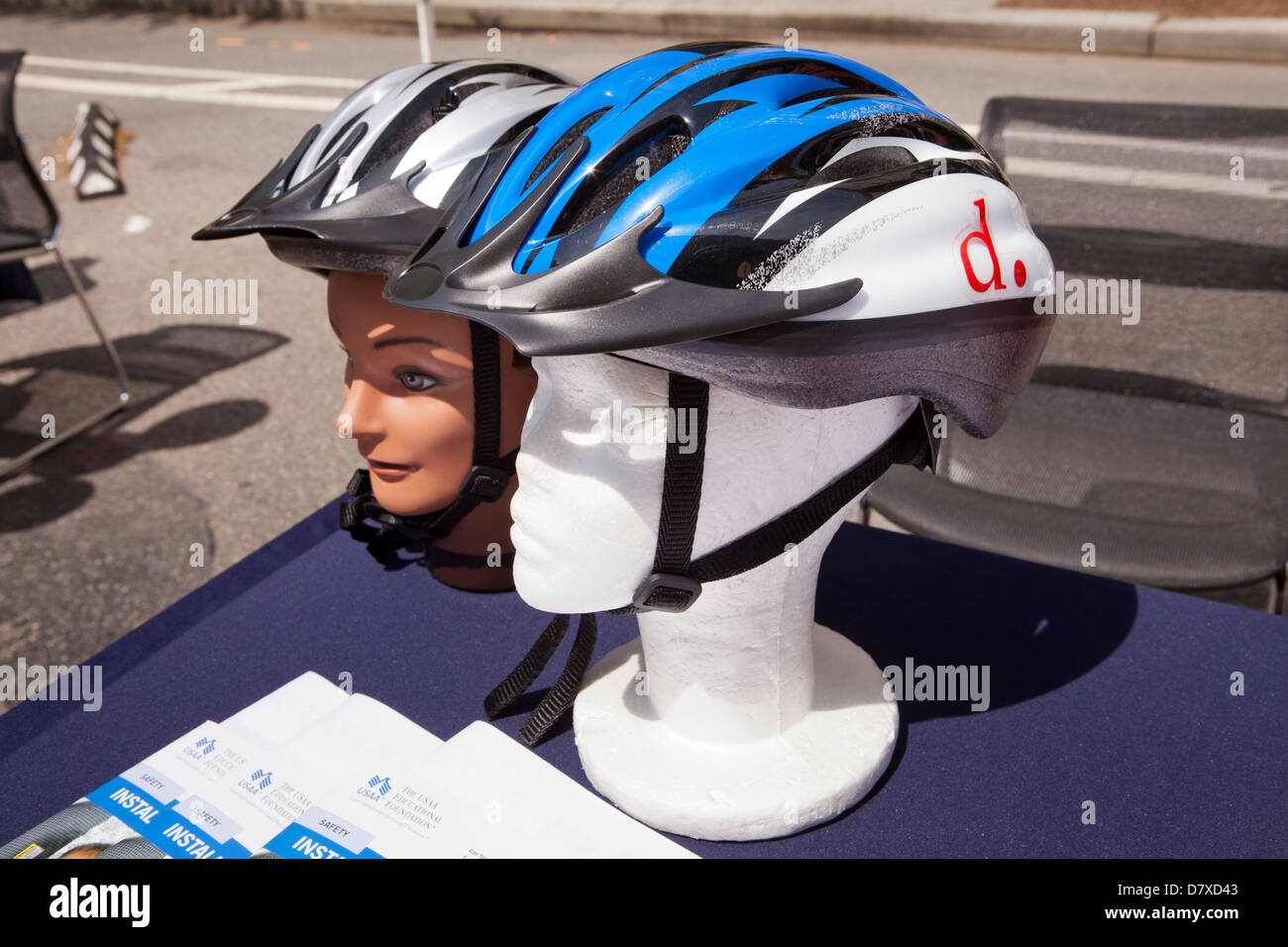 Bicycle helmets on dummy heads Stock Photo