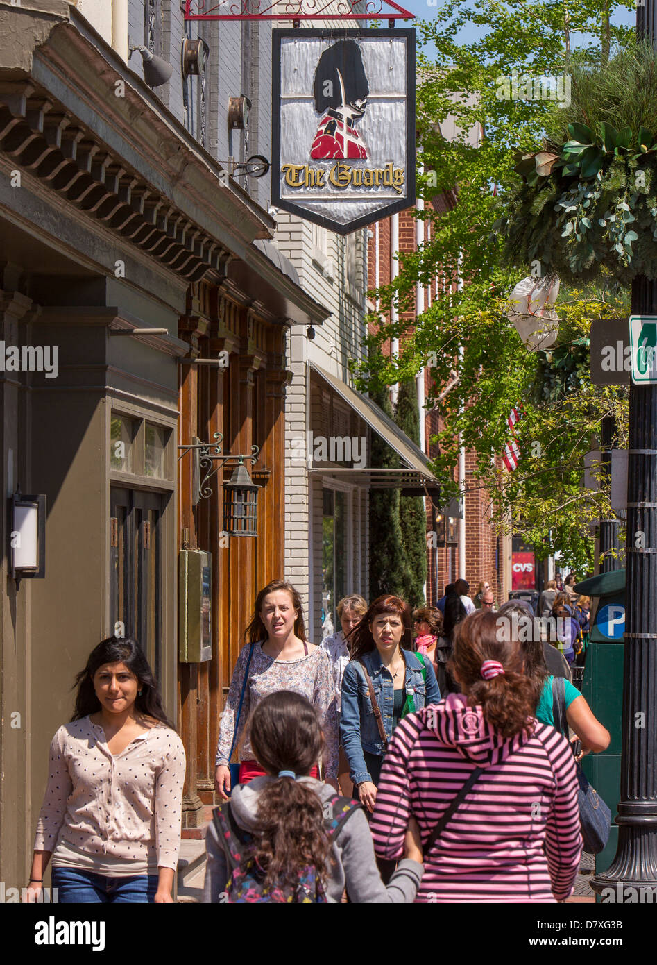 WASHINGTON, DC, USA - People walking by The Guards restaurant on M ...