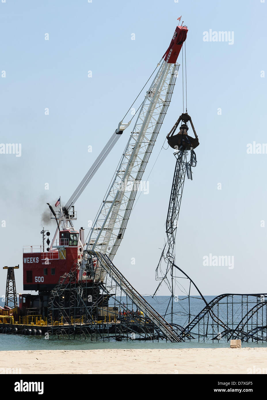 Seaside Heights,  NJ, USA, 14 May, 2013. The Jet Star roller coaster off of the Seaside Boardwalk is demolished immediately following a visit by Prince Harry of Wales.  The coaster became a widely-recognized symbol of the destruction caused by Superstorm Sandy. Stock Photo