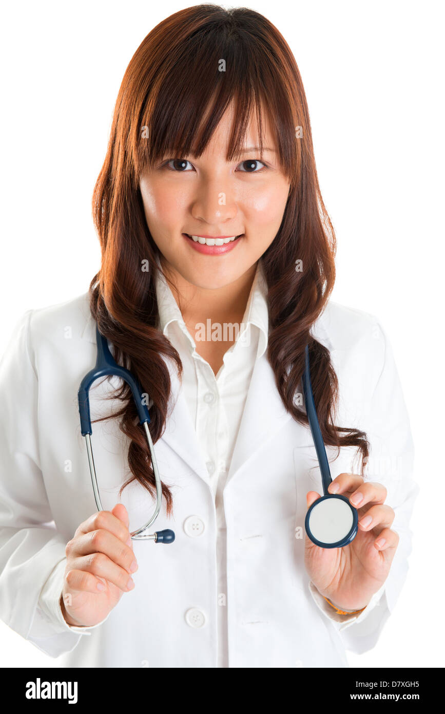 Young Asian nurse or medical student smiling isolated on white wearing