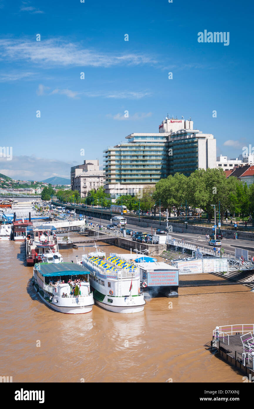 Budapest Hungary Pest embankment promenade River Danube pleasure boats bars Marriott Intercontinental Hotel hotels Stock Photo