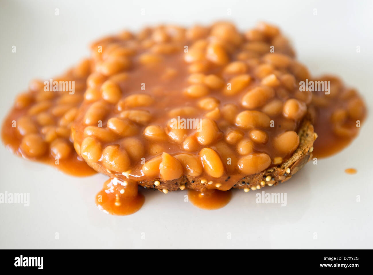 close up of baked beans on toast Stock Photo