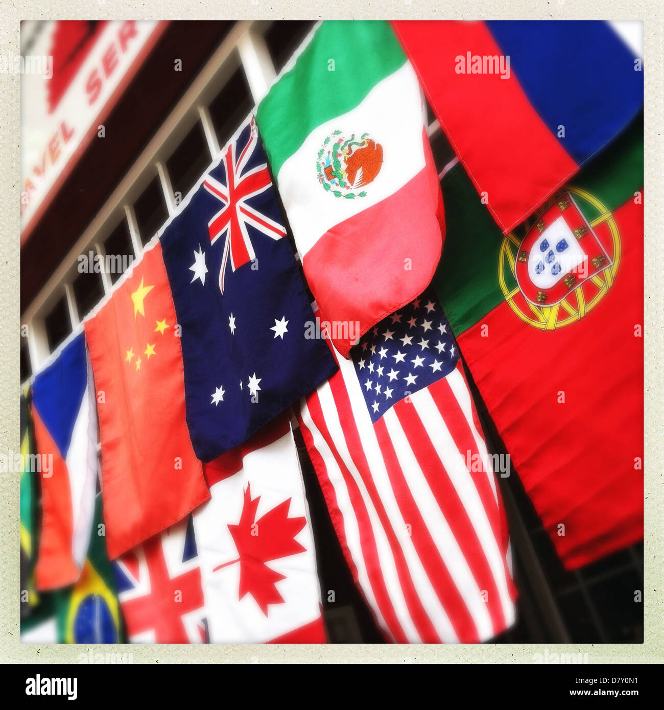 World flags hung from building Stock Photo