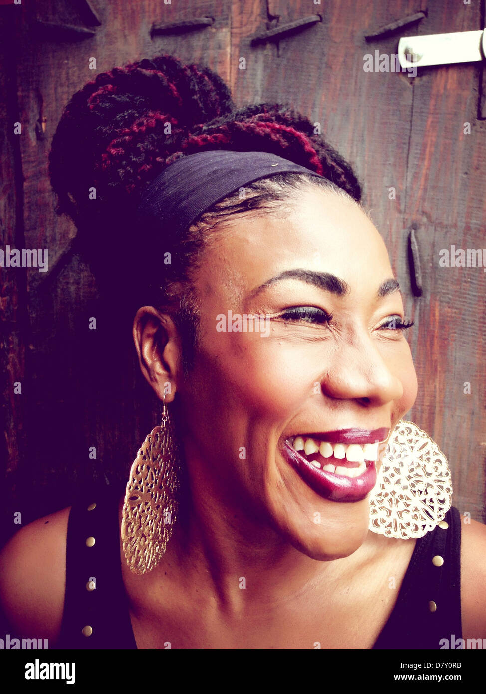 Black woman laughing - Smartphone Captured Stock Image